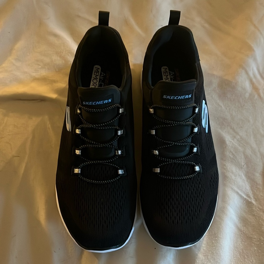 Like new Sketckers memory foam slip on tennis shoe